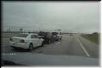 Truck pulling a SUV pulling a car