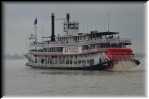 A Paddle boat going down the Mississippi